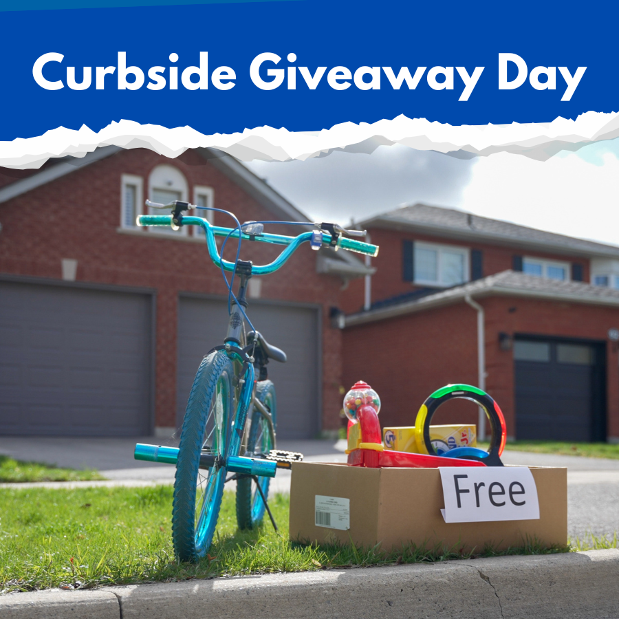 A blue background with white text reading Curbside Giveaway Day and a picture of a bike and a box of items marked as free on the curb of a residential home.  