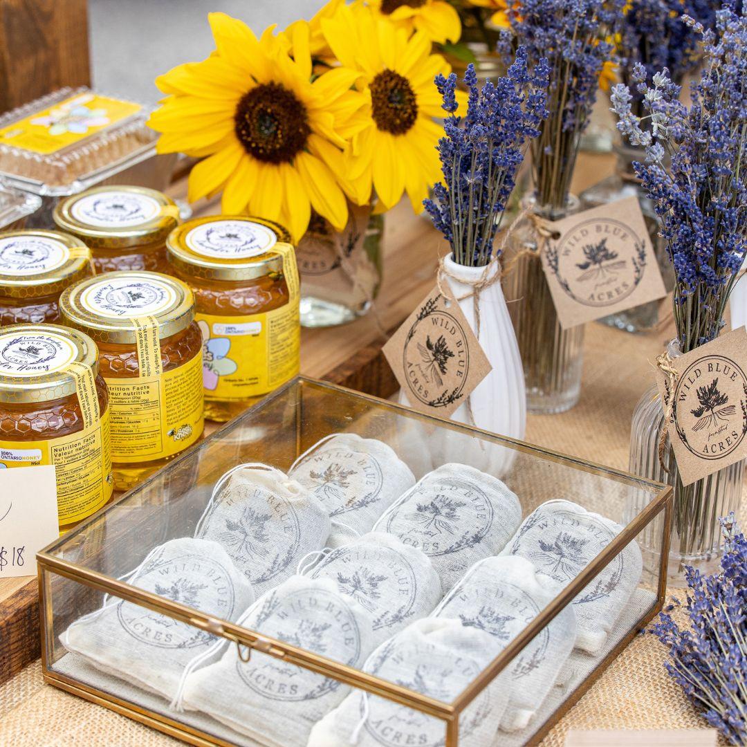 sunflowers, honey, lavender laid out on a table