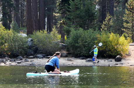 Staff and volunteers survey Donner Lake.