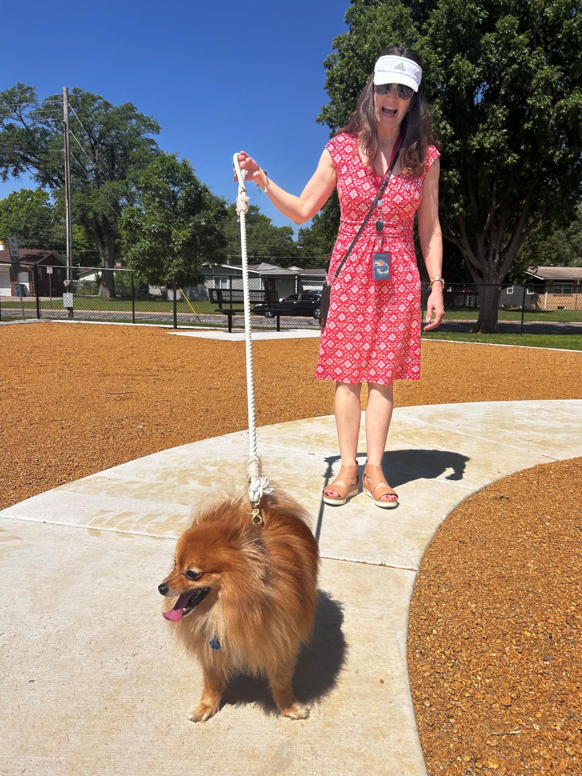 Country Acres Dog Park ribbon-cutting May 14 2025 District 5 CSR Teresa Veazey with PIO Megan Lovely's dog Flynn
