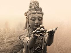 Kwan Yin holding an offering