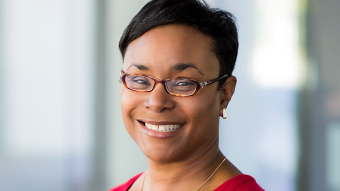 Woman with short hair wearing glasses