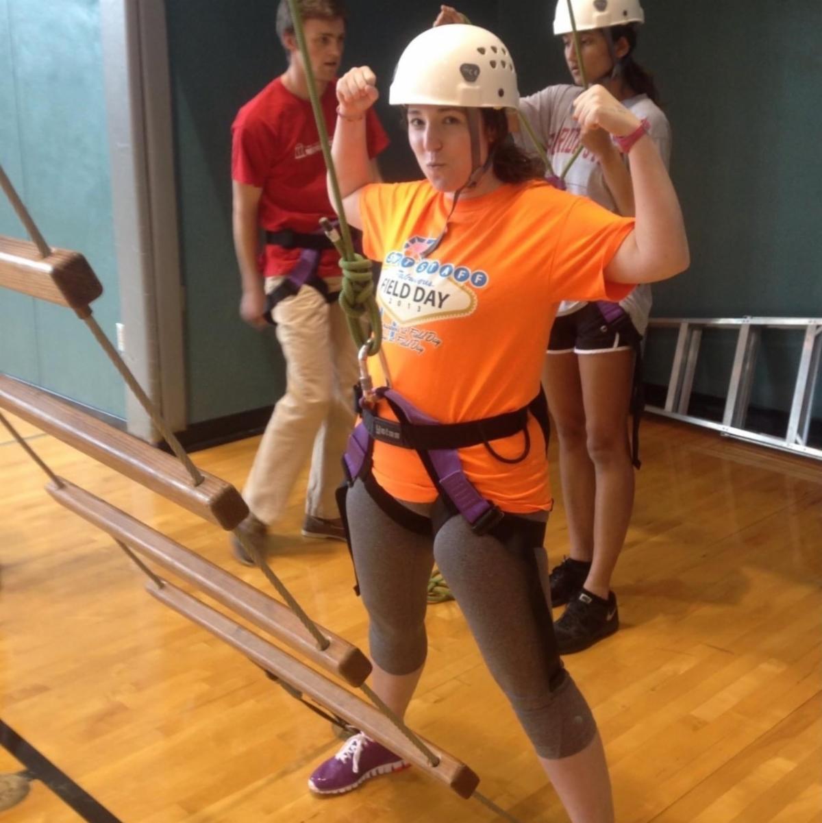 Ashley Fallaize in rock climbing harness and helmet 