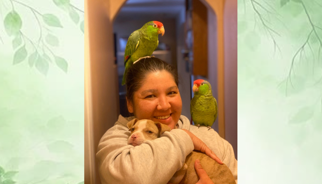 Dalia with her birds and dog