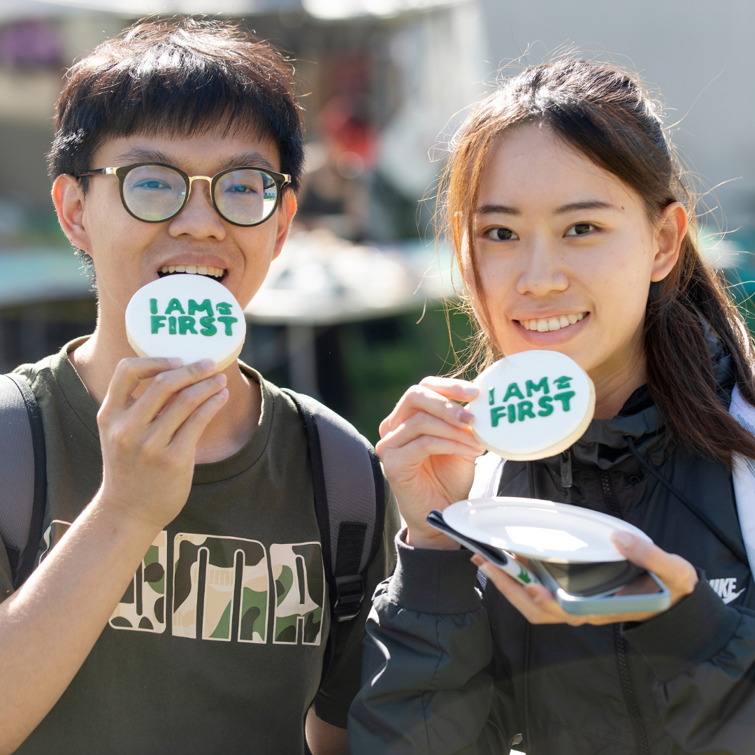 I Am First students eating a cookie