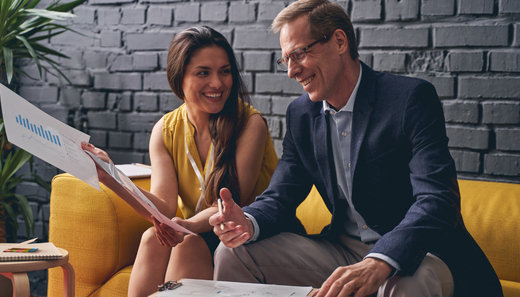 Manager working with employee