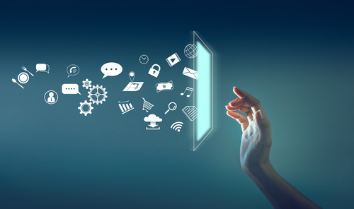 the hand touching the screen with a lot of icon throw out from screen_ technology about internet of thing concept.