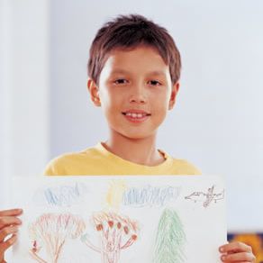 boy-holding-drawing.jpg