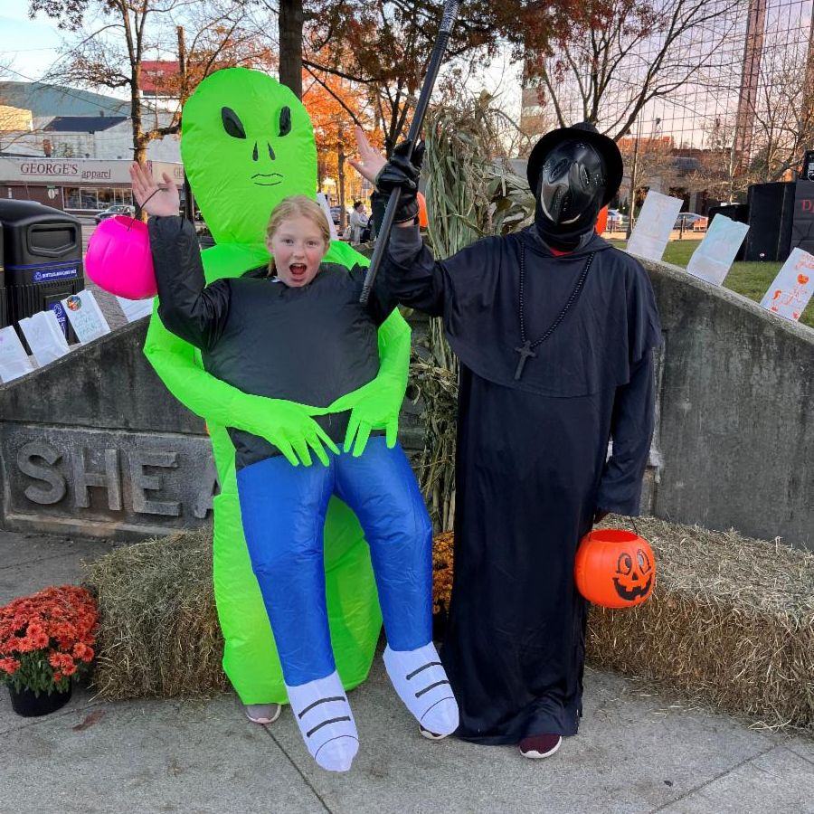 Kids posing in their Halloween costumes 