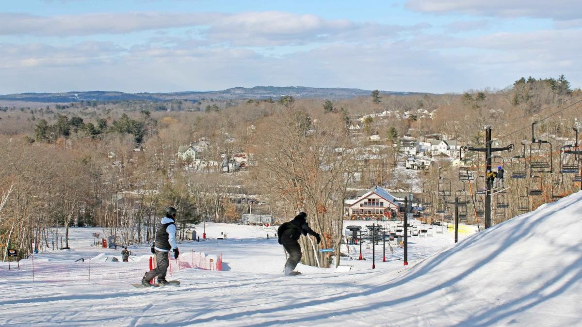 People snowboarding at McIntyre Ski Area 