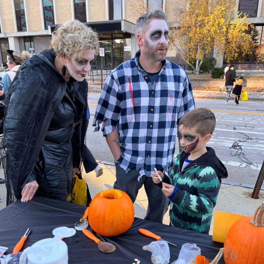 Family carving pumpkin 