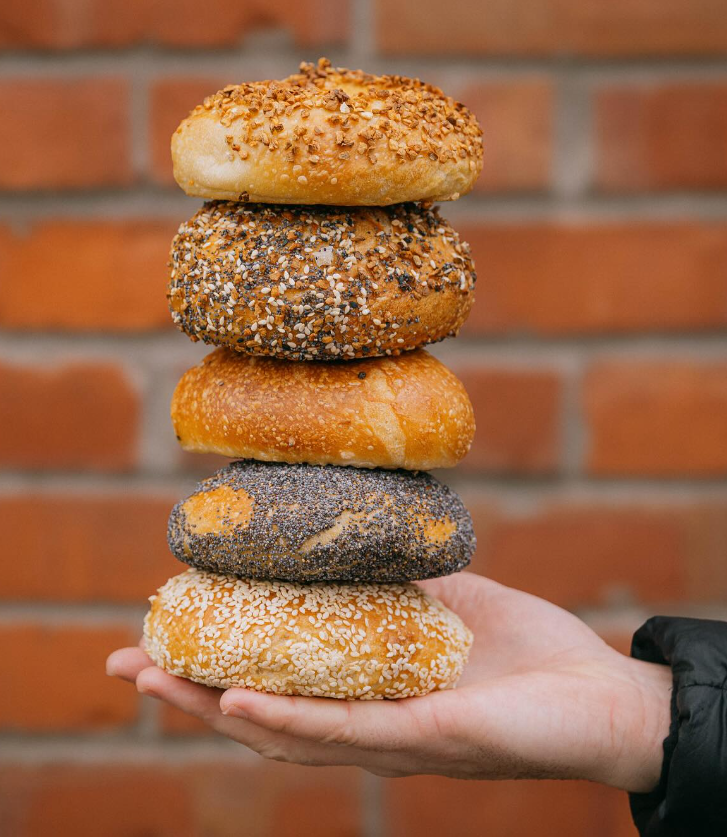 Bagels Stacked on Hand