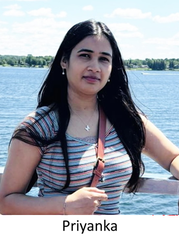 brown woman with long dark hair in an outdoor lake setting