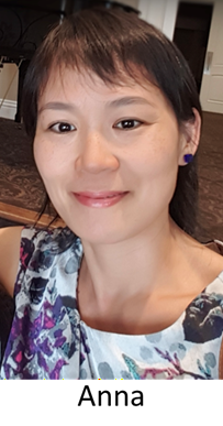 Asian woman with short dark hair smiling at the viewer 
