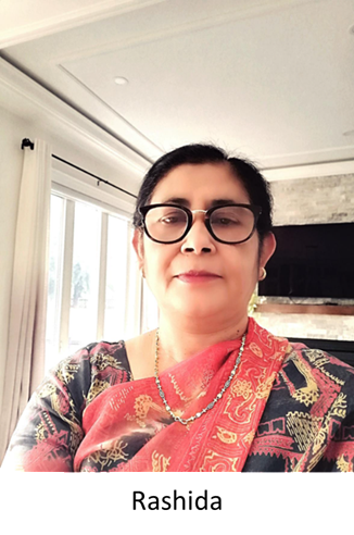 Brown woman wearing glasses and wearing a sari with vibrant colours