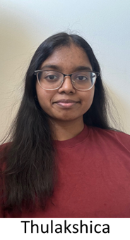 brown woman with long dark hair and glasses gazes at the viewer