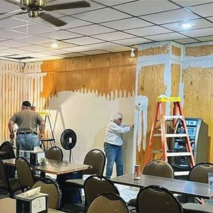 Volunteers paining room