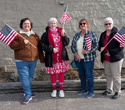 ALA members holding USA flags