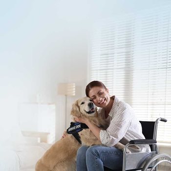 Woman in wheelchair with service animal