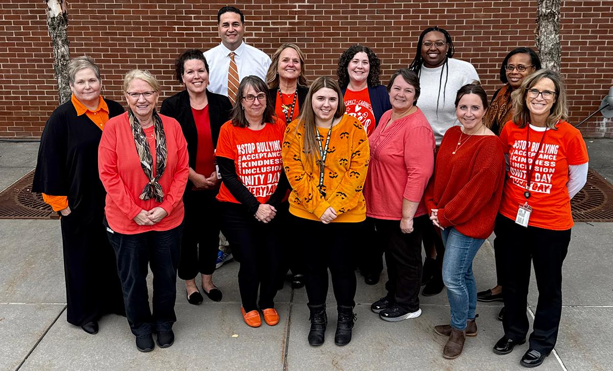 Employees wear orange to support anti-bullying