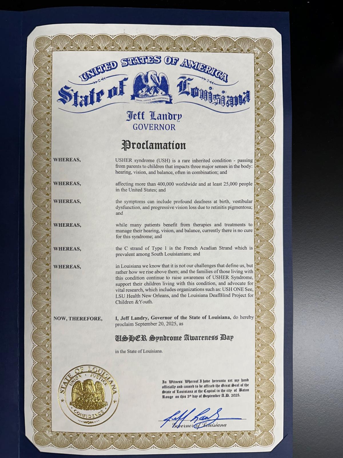 Picture is of the USHER Syndrome Proclamation signed by Governor Landry with the words United States of American the State of Louisiana with the Pelican and babies seal at the top