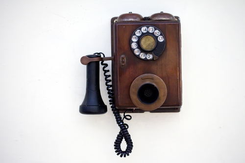 Retro phone on a white wall