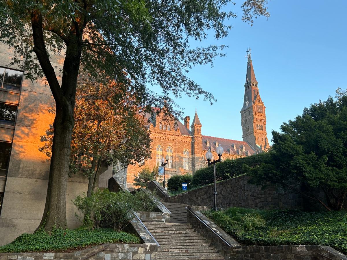 Healy Hall, during sunrise, with stairs in the foreground