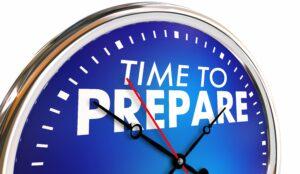 A stopwatch with a blue background and the following text in white: Time to Prepare