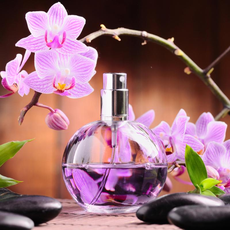orchid and perfume bottle