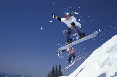 two-jumping-snowboarders.jpg