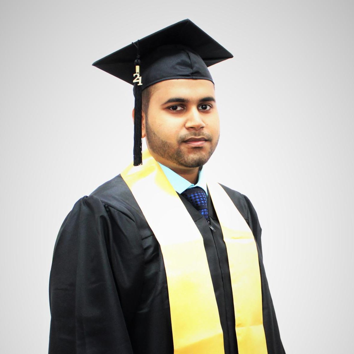 Mahim Pritom in a cap and gown