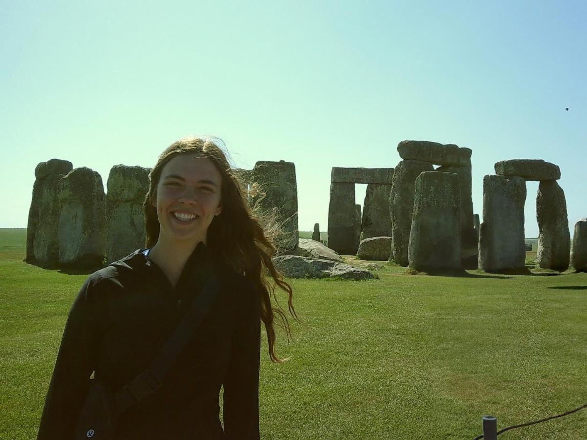 A self picture of undergraduate student, Emalie Mullane, in front of Stonehenge.