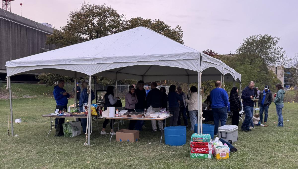 Department members and alumni at the tailgate.