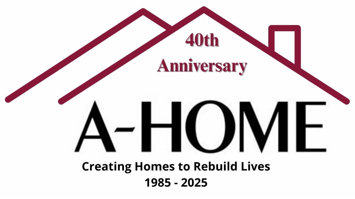 red outline of house roof and text  40th anniversary a-home in black