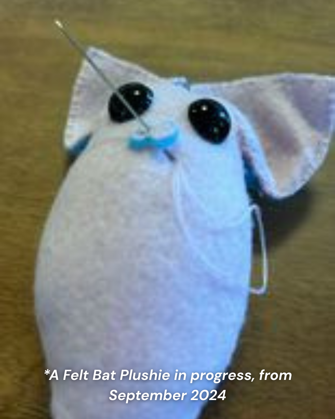 An in-progress felt bat plushie from September 2024.