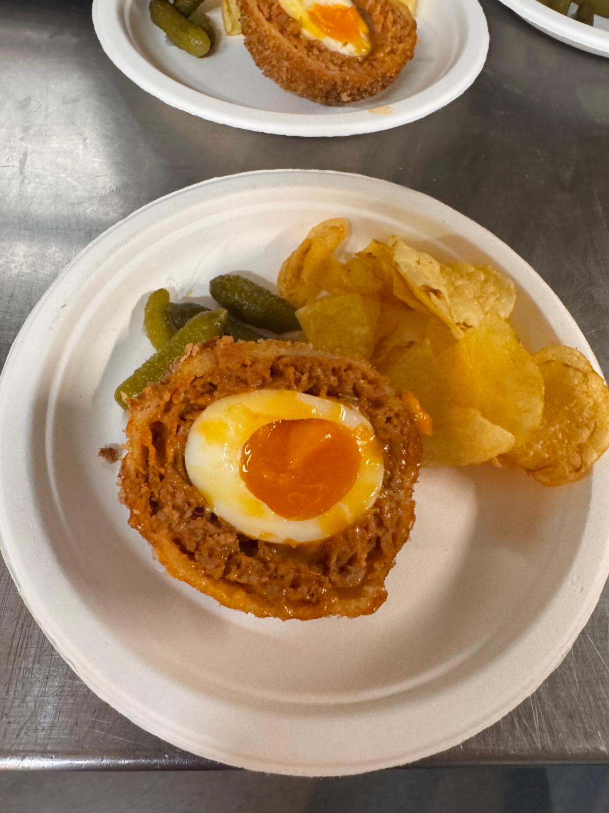 Chorizo scotch eggs and dirty bravas