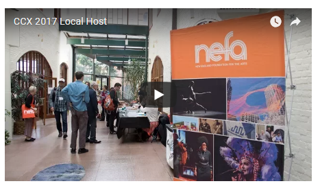 still image from the video linked of a banner that features images of our grantees' work